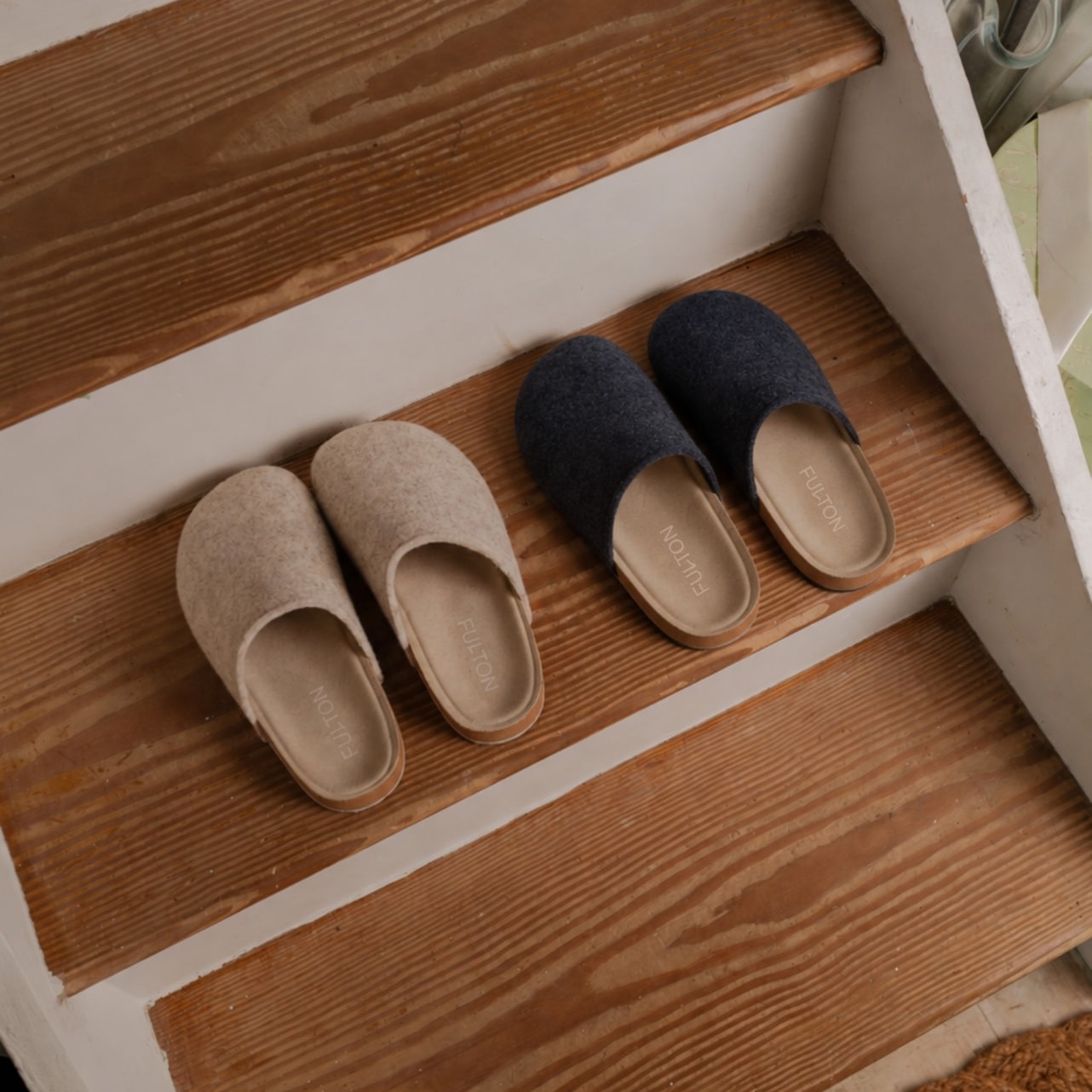 Fulton house shoes on wooden stairs